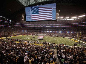 The National Anthem is performed prior to the NFL's Super Bowl XLV football game between the Pittsburgh Steelers and Green Bay Packers. (REUTERS/Gary Hershorn)