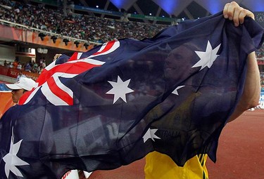 Australia's Steve Hooker celebrates after winning the gold during the men's pole vault final at the Commonwealth Games in New Delhi on Oct. 11, 2010. (REUTERS)