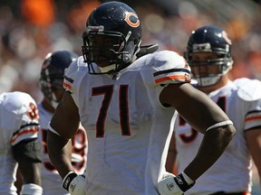 Israel Idonije has spent 10 seasons in the NFL and has carved himself a nice niche on the defensive line of the Chicago Bears. But his main focus is on helping his team find a way into the post-season. (JONATHAN DANIEL/AFP-Getty Images)