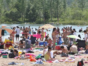 The beach at Birds Hill Park may be a good place to hang out Sunday. But storms also may return. (Winnipeg Sun files)