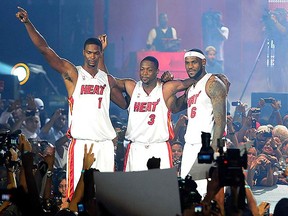LeBron James , Dwyane Wade and Chris Bosh attend the Miami Heat Summer 2010 player welcoming event held at the American Airlines Arena in Miami, Florida. (Wenn.com)
