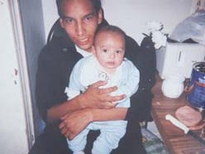 Murder victin Ronnie Kakegamic with his oldest child Breayon. (HANDOUT)