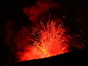 Lava spews from a volcano as it erupts near Eyjafjallajokull April 19, 2010. REUTERS/Lucas Jackson