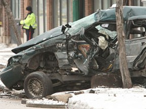 The aftermath of the crash that killed taxi driver Antonio Lanzellotti on March 29, 2008. (Winnipeg Sun Files)