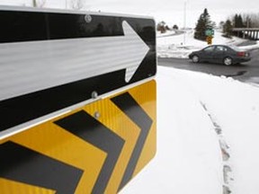 Signage at a roundabout on Brookfield Dr. near the Airport Pkway. (TONY CALDWELL Ottawa Sun)