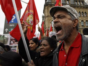 Pro-Tamil supporters chant during extended protests in front of Parliament Hill in Ottawa April 18, 2009. The protesters have been calling on Canada to pressure the Sri Lankan government to end the country's 25-year-old civil war. (ANDRE FORGET/QMI Agency)