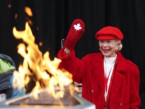Barbara Ann Scott waves to the public during the Olympic Torch Relay for the 2010 Vancouver Olympic games at City Hall in Ottawa Dec. 12, 2009. Her sports legacy will be honoured at city hall with a room dedicated to displaying her awards, Mayor Jim Watson announced Jan. 25, 2012.  (ANDRE FORGET/QMI AGENCY)