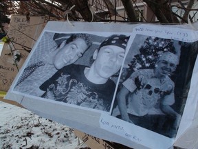 Photos of Matthew Reynolds, left, and Tyler (T.J.) Hawula (on right in the first photo and alone in the second) included in a memorial in front of the home where the pair was murdered on Dec. 05, 2009. (Chris Kitching/SUN MEDIA)