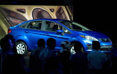 Ford Motor Company unveils thier new North American Ford Fiesta car at the Fiesta Movement Awards Celebration a day before the official debut at the Los Angeles Auto Show in the Hollywood area of Los Angeles, California December 1, 2009. REUTERS/Gus Ruelas