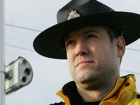 Sgt. Aubrey Zalaski of the Edmonton police traffic section near the red light cameras at 91 Street and 34 Avenue. (David Bloom/Sun Media)