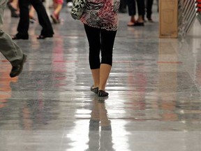 A student walks down the hallway at Victoria School of Performing Arts on the first day of school.   (PERRY MAH/Sun Media)