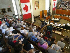 Hundreds of Winnipeggers gathered to debate a hotly contested change to the city's water utility at City Hall on July 22, 2009. Council voted to create the arm's-length body to manage water and waste services after nine hours of public presentations and debate. (Brian Donogh/SUN MEDIA)