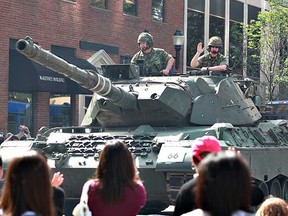 A Leopard tank and its crew take part in the Capital EX Parade. (EDMONTON SUN FILE)