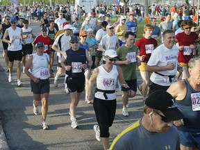 Runners start the full marathon at the Manitoba Marathon, Sunday, June 21, 2009. (BRIAN DONOGH/SUN MEDIA)