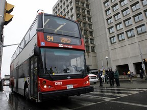 The city will buy 75 double decker buses like the one shown here. Officials say spending $81M to buy them will save $10M. (OTTAWA SUN FILE PHOTO)