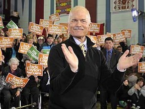 Canada's NDP leader Jack Layton arrives at a campaign rally in Winnipeg, Manitoba April 5, 2011. REUTERS/Fred Greenslade