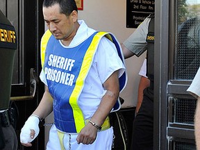 Vince Li, suspect in the murder of Tim McLean aboard a Greyhound bus, leaves after making a court appearance in Portage la Prairie August 5, 2008. (FRED GREENSLADE, Reuters)
