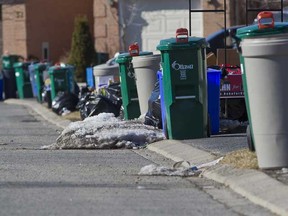 Garbage waits to be picked up in Ottawa. (ERROL MCGIHON/THE OTTAWA SUN)