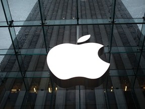 The Apple Inc. logo is seen in the lobby of New York City's flagship Apple store in this January 18, 2011 file photo. REUTERS/Mike Segar/Files