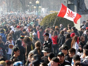 Marijuana smoke fills the air during the 4-20 celebrations at the Manitoba Legislature in Winnipeg Wednesday, April 20, 2011.