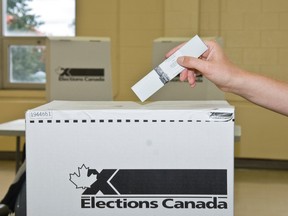 A vote is placed in a ballot box. (Elections Canada)