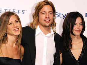 Jennifer Aniston, Brad Pitt, and Courteney Cox are seen at a charity gala in 2003. (Supplied photo)