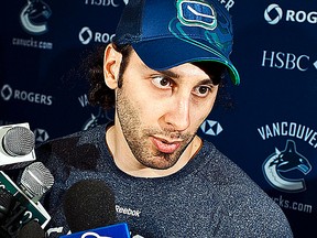 Roberto Luongo's overall numbers were strong, but he didn't dispel his reputation for surrendering ill-timed, weak goals. (QMI Agency/Carmine Marinelli)