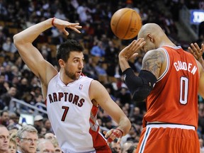 Raptors' Andrea Bargnani saves the ball in front of Milwaukee Bucks Drew Gooden  during a game in March at the ACC. ( REUTERS/Mark Blinch)
