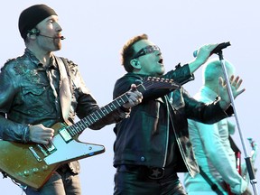 The Edge, Bono and Adam Clayton of U2 perform during their 360 World Tour in Winnipeg May 29, 2011. (BRIAN DONOGH/QMI AGENCY)