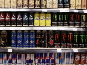 Rows of energy drink cans fill the shelves of a grocery store. (Chris Roussakis/QMI Agency files)