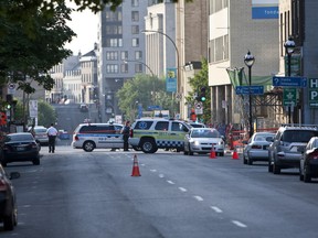 Police were involved in a shooting that killed an innocent bystander in downtown Montreal Tuesday morning. (Stéphane Grégoire)