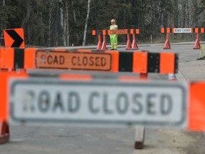 Road closure signs are displayed at the top of Scona Road, May 9, 2011. ( LAURA PEDERSEN/EDMONTON SUN)