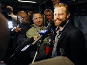 Bruins goaltender Tim Thomas speaks with the media in at Rogers Arena Vancouver, B.C., June 9, 2011. (ERIC BOLTE/QMI Agency)