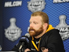 Bruins' Tim Thomas talks to the media after practice at TD Banknorth Garden in Boston, Mass. on June 12th  2011. (ERIC BOLTE/QMI AGENCY)