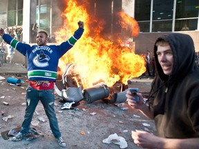 Hockey fans riot in the streets of Vancouver after the Canucks lost Game 7 of the Stanley Cup final, June 15, 2011. (Carmine Marinelli/QMI Agency)