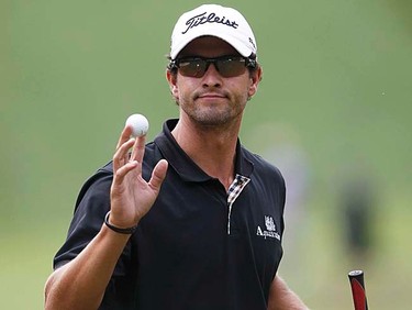 Australia's Adam Scott reacts after his birdie on the 17th hole during the first round of the 2011 U.S. Open at Congressional Country Club in Bethesda, Maryland, Thursday, June 16, 2011. (REUTERS/Mathieu Belanger)