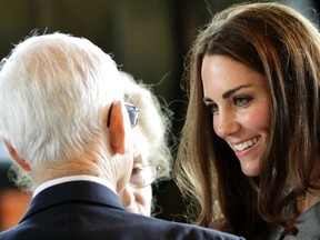 Catherine, the Duchess of Cambridge, talks with a guest during a visit to the Canadian War Museum in Ottawa on July 2, 2011. (JOHN MAJOR/QMI AGENCY)