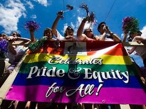 Revellers take part in the Gay Pride Parade in Toronto on July, 3, 2011.  (REUTERS)