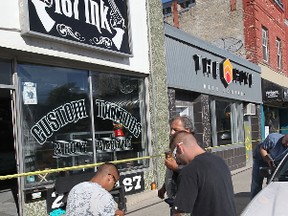 187 ink owner Wayne Nuytten stands outside the Osborne Street tattoo parlour after it was firebombed on July 13, 2011. (WINNIPEG SUN)