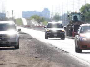 Police with photo radar guns could be in place as soon as July 19. The construction zone cops are warning motorists about spans from south of Warde Avenue to north of the perimeter.  (Winnipeg Sun files)
