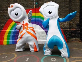 The 2012 Olympic mascot Wenlock (left) and Paralympic mascot Mandeville pose for photographers in a school playground in London on May 19, 2010. (REUTERS/Suzanne Plunkett/Files)