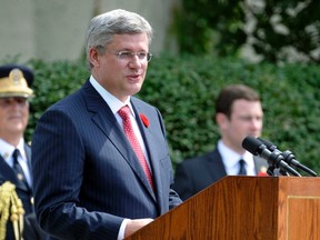 Prime Minister Stephen Harper speaks during a memorial service at the Korea Veterans National Wall of Remembrance in Brampton July 27, 2011. (REUTERS/Mike Cassese)