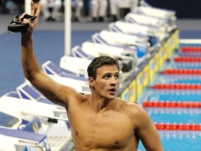 Ryan Lochte of the U.S. acknowledges the crowd after winning the men's 200m backstroke final at the 14th FINA World Championships in Shanghai July 29, 2011. (REUTERS)