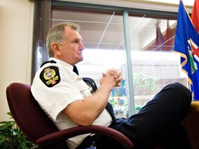 Police chief Rod Knecht speaks with the Edmonton Sun in his office at police headquarters in Edmonton, Alta., on Tuesday, June 14 2011. (AMBER BRACKEN/EDMONTON SUN)