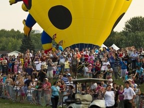 Large crowds watching crews preparing for launch at the Gatineau Hot Air Balloon Festival. Saturday September 3,2011. (ERROL MCGIHON/THE OTTAWA SUN/QMI AGENCY)