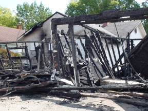 The man is accused in a recent arson spree that included a fire that damaged four Hector Street homes and killed a dog and two cats. (Winnipeg Sun files)