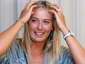 Maria Sharapova gestures while listening to a question during an interview in Taipei on Wednesday, Sept. 21, 2011. (REUTERS/Pichi Chuang)