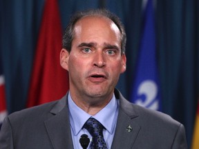 NDP MP Guy Caron speaks to the media in Ottawa on September 28, 2011. (Andre Forget/QMI Agency)