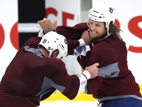 Colton Orr (right) and Mike Brown of the Maple Leafs work on tough-guy techniques in October. (Craig Robertson/Toronto Sun)