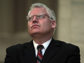 Bill Whatcott waits before entering the court room at the Supreme Court of Canada in Ottawa on October 12, 2011. (Chris Roussakis/QMI Agency)